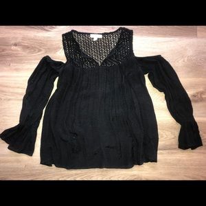 Black top with cut-out shoulders